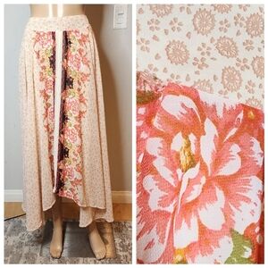 Free People Flowy Shark bite hem maxi skirt. Pull on stretch waist. Women's XS